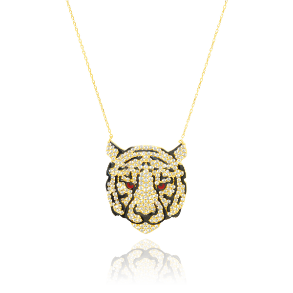 Collier orné de son motif en forme de tête de tigre serti de zirconiums, monté sur une chaine forçat massive, en Or Jaune et Or Noir 18 Carats - 750/000.  Symbole d'amitié ou de séduction, chaînes et colliers n'ont qu'un but : sublimer votre cou.    CARACTERISTIQUES :  Longueur (cm) : 45.00 Largeur motif (cm):  2.30 Poids (gr) : 8.00 Matière : Or 18 Carats - 750/000 19701