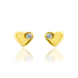 Boucles d'oreilles en forme de cœur serti d'un zirconium serti clos, en Or Jaune 18 Carats - 750/000.  Offrir une boucle d'oreille c'est être sûr que le cadeau plaira.   CARACTERISTIQUES :  Diamètre (mm) : 4.50 Poids (gr) : 0.66      Matière : Or 18 Carats - 750/000 20256