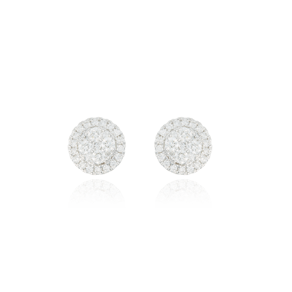 Boucles d'oreilles clous rondes, pavées de diamants, en Or Blanc 18 Carats - 750/000.  Offrir une boucle d'oreille c'est être sure que le cadeau plaira.   CARACTERISTIQUES :  Poids (gr) : 2.47 Nombre de diamant : 54 Carats : 0.49 Matière : Or 18 Carats - 750/000 20315