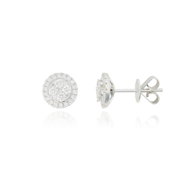 Boucles d'oreilles clous rondes, pavées de diamants, en Or Blanc 18 Carats - 750/000.  Offrir une boucle d'oreille c'est être sure que le cadeau plaira.   CARACTERISTIQUES :  Poids (gr) : 2.47 Nombre de diamant : 54 Carats : 0.49 Matière : Or 18 Carats - 750/000 20315