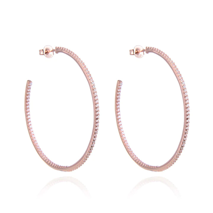 Boucles d'oreilles créoles rhodiées, rosées ou dorées, serties zirconiums, en Argent - 925/000.  Les créoles, véritables accessoires de mode intemporels, ajoutent une touche d'élégance à n'importe quelle tenue.   CARACTERISTIQUES :  Poids (gr) : 9.70 Diamètre (cm): 6.00 Matière : Argent - 925/000  19898 - 20463