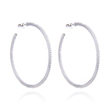 Boucles d'oreilles créoles rhodiées, rosées ou dorées, serties zirconiums, en Argent - 925/000.  Les créoles, véritables accessoires de mode intemporels, ajoutent une touche d'élégance à n'importe quelle tenue.   CARACTERISTIQUES :  Poids (gr) : 9.70 Diamètre (cm): 6.00 Matière : Argent - 925/000  19898 - 20463