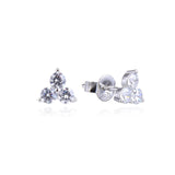 Boucles d'oreilles clous, rhodiées, rosées ou dorées, serties de 3 zirconiums, en Argent - 925/1000.  Offrir une boucle d'oreille c'est être sûr que le cadeau plaira.    CARACTERISTIQUES :  Poids (gr) : 1.04 Matière : Argent - 925/000  19852