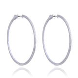 Boucles d'oreilles créoles rhodiées, dorées ou rosées, serties de zirconiums intérieur et extérieur, fermeture bouton pression, en Argent - 925/000.  Les créoles, véritables accessoires de mode intemporels, ajoutent une touche d'élégance à n'importe quelle tenue.   CARACTERISTIQUES :  Poids (gr) : 10.60 Diamètre (cm) : 4.50 Matière : Argent - 925/000  18864