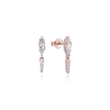 Boucles d'oreilles clous trio et poires pendantes, rhodiées ou rosées, serties de zirconiums, en Argent - 925/000.  Bien plus qu'un vêtement, la boucle d'oreille pendante, habille en toutes circonstances. Elle révèle votre visage quelque soit votre coiffure.    CARACTERISTIQUES :  Poids (gr) : 1.40 Matière : Argent - 925/000  19909 