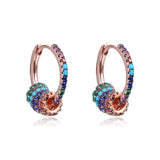 Boucles d'oreilles créoles, rhodiées ou rosées, serties de zirconiums multicolores, en Argent - 925/000.  Les créoles, véritables accessoires de mode intemporels, ajoutent une touche d'élégance à n'importe quelle tenue.  CARACTERISTIQUES :  Poids (gr) : 3.20 Matière : Argent - 925/000  19862 - 20488