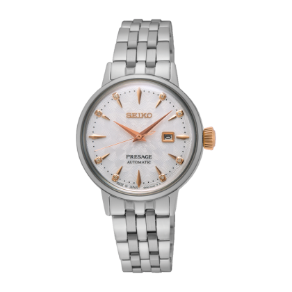 REF : SRE009J1   Le modèle Seiko PRESAGE Cocktail SRE009J1 est inspiré du cocktail CLOVER Club. Cette montre est agrémentée d'un cadran blanc et d'aiguilles et d'index en or rose. Huit diamants placés au niveau des index ajoutent une touche de luxe et de glamour au poignet.   CARACTERISTIQUES :   Calibre : 2R05 Étanchéité5 bar Index : Spécificité Diamants Dimension boitier : 28.00 mm Epaisseur : 10.89 mm Garantie : 2 ans constructeur ( internationale )