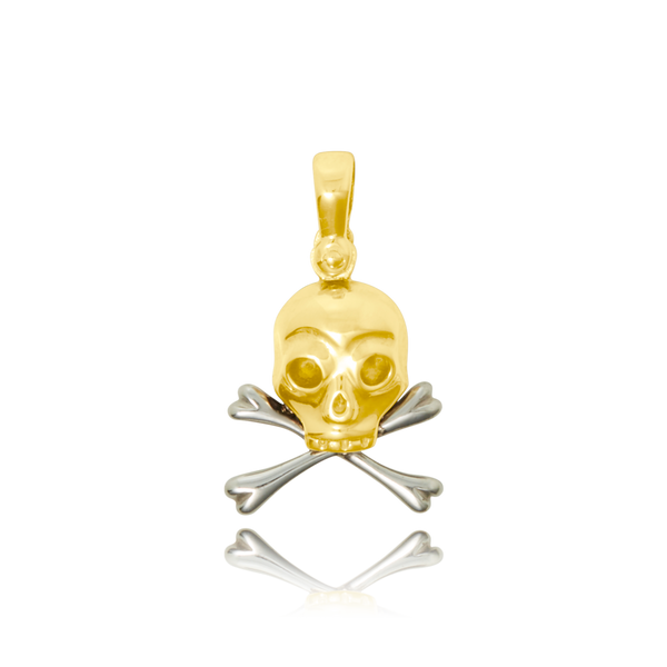 Pendentif en forme de Tête de mort en Or Jaune et Or Blanc 18 Carats - 750/000.     CARACTERISTIQUES :  Poids (gr) : 3.09 Dimensions H x l (mm) : 14.2 x 13.65 Matière : Or 18 Carats - 750/000 15781