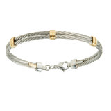 Jonc pour enfant en Acier, serti de 3 inserts en Or Jaune massif 18 Carats - 750/000.  Qu'il soit classique ou fantaisiste, le bracelet saura sans conteste faire plaisir.  CARACTERISTIQUES :  Diamètre jonc (cm) : 4.70  Poids (gr) : 6.12  Matière : Or 18 Carats - 750/000  19011