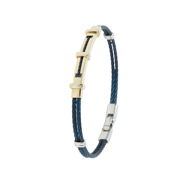 Jonc 2 câbles Acier PVD Bleu, motif central en Or Jaune et Or Blanc massif 18 Carats - 750/000.  Qu'il soit classique ou fantaisiste, le bracelet saura sans conteste faire plaisir.     CARACTERISTIQUES :  Largeur jonc (mm) : 2.00 Diamètre jonc (cm) : 6.50 Couleur câble : Bleu  Poids d'or (gr) : 3.40 Matière : Acier et Or 18 Carats - 750/000 19541