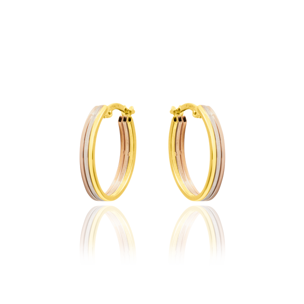 Boucles d'oreilles créoles ovales et plates en Or Jaune, Or Blanc et Or Rose, 18 Carats - 750/000.   Les créoles, véritables accessoires de mode intemporels, ajoutent une touche d'élégance à n'importe quelle tenue.   CARACTERISTIQUES :  Dimensions (mm) : H 19.50 x l 15.50 Epaisseur (mm) : 3.21 Poids (gr) : 2.39   Matière : Or 18 Carats - 750/000 20015