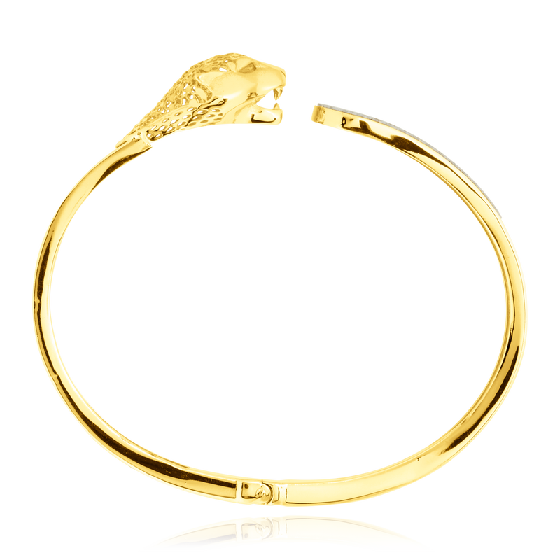 Jonc monté d’une panthère et motif filigrane, en Or Jaune et Or Blanc 18 Carats - 750/000.  Qu'il soit classique ou fantaisiste, le bracelet saura sans conteste faire plaisir.  CARACTERISTIQUES :  Diamètre jonc (cm) : 6.00 Poids (gr) : 10.79 Matière : Or 18 Carats - 750/000 20095 