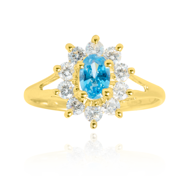 Bague marquise sertie d'un zirconium central bleu topaze et de zirconiums blancs, en Or Jaune 18 Carats - 750/000.  Cinq possibilités d'embellir vos doigts, portez une de nos bagues.   CARACTERISTIQUES :  Motif central (mm) : 10.94 x 12.24 Epaisseur (mm) : 1.85 Poids (gr) : 2.28       Matière : Or 18 Carats - 750/000 20211