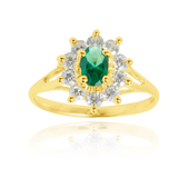 Bague marquise sertie d'un zirconium central vert et de zirconiums blancs, en Or Jaune 18 Carats - 750/000.  Cinq possibilités d'embellir vos doigts, portez une de nos bagues.   CARACTERISTIQUES :  Motif central (mm) : 10.68 x 12.20 Epaisseur (mm) : 1.90 Poids (gr) : 2.22       Matière : Or 18 Carats - 750/000 20239