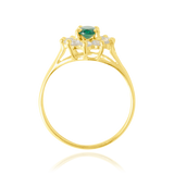 Bague marquise sertie d'un zirconium central vert et de zirconiums blancs, en Or Jaune 18 Carats - 750/000.  Cinq possibilités d'embellir vos doigts, portez une de nos bagues.   CARACTERISTIQUES :  Motif central (mm) : 10.68 x 12.20 Epaisseur (mm) : 1.90 Poids (gr) : 2.22       Matière : Or 18 Carats - 750/000 20239