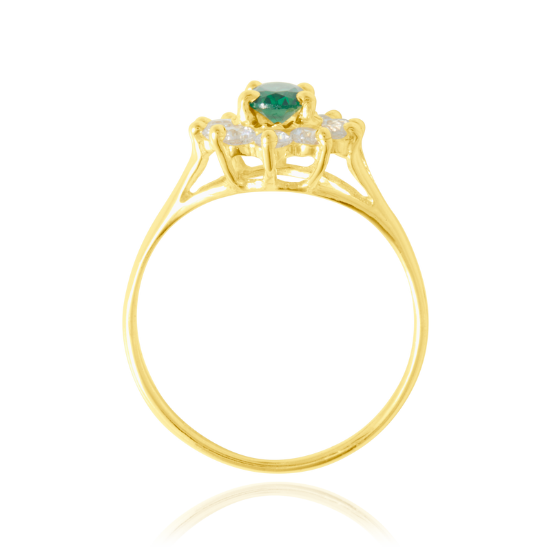 Bague marquise sertie d'un zirconium central vert et de zirconiums blancs, en Or Jaune 18 Carats - 750/000.  Cinq possibilités d'embellir vos doigts, portez une de nos bagues.   CARACTERISTIQUES :  Motif central (mm) : 10.68 x 12.20 Epaisseur (mm) : 1.90 Poids (gr) : 2.22       Matière : Or 18 Carats - 750/000 20239