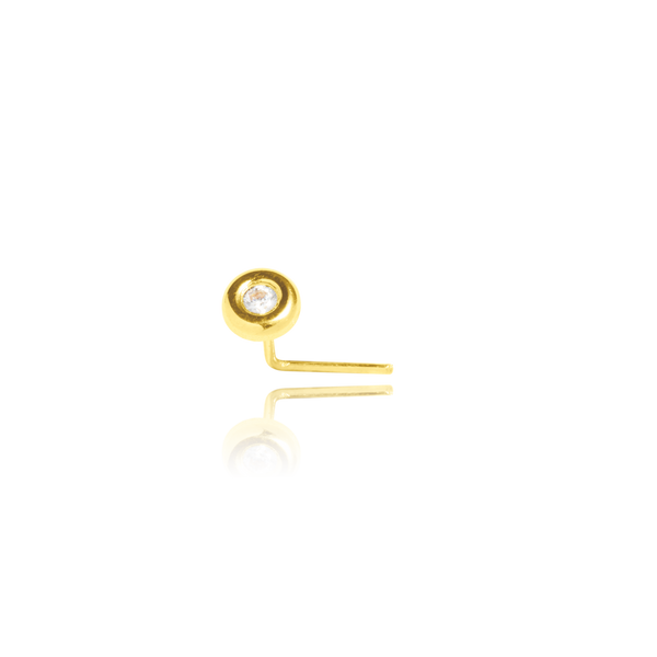 Piercing de nez monté d'un zirconium en serti bouée, en Or Jaune 18 Carats - 750/000.   CARACTERISTIQUES :  Epaisseur axe (mm) : 0.60 Diamètre serti (mm) : 4.20 Poids (gr) : 0.13 Matière : Or 18 Carats - 750/000 19617